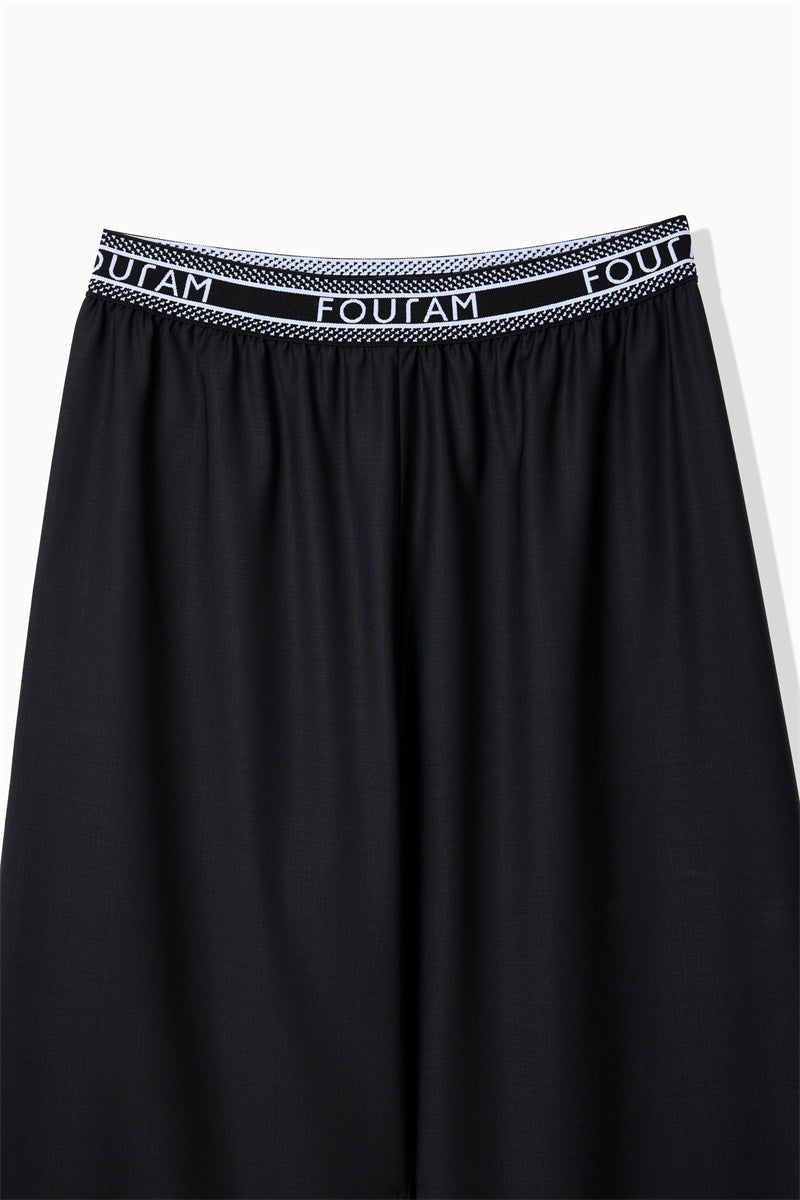 GLOSS COATED WOOL PANTS