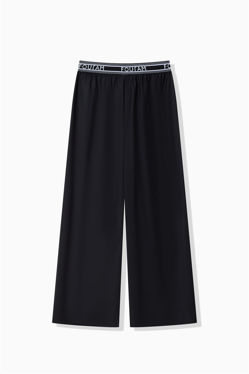 GLOSS COATED WOOL PANTS